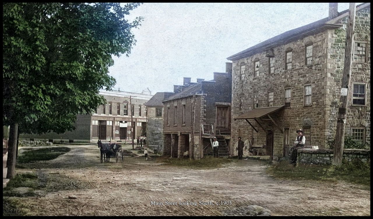 King Street (Main Street) looking south, c. 1905 — horse and wagon in front of the Old Stone Mill