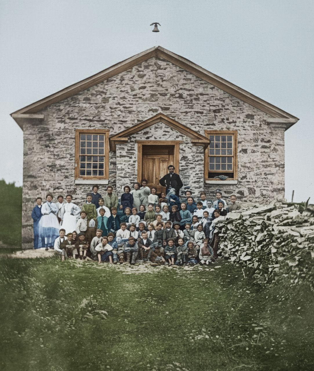 Stone School House, c. 1870 — the building that stood on the site before the Old Town Hall was built